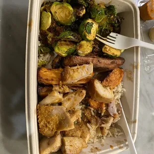 brussel sprouts and potatoes in a container