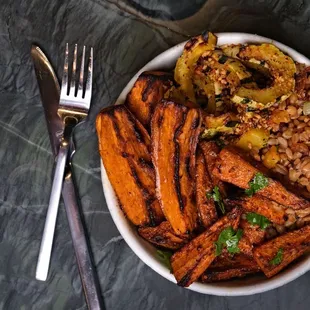 Fall Harvest Plate: Farro with Fall Vegetables, Cinnamon Sweet Potatoes, Delicata Squash and Harissa Carrots.