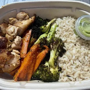 Build your own bowl- Charred Chicken (thigh), harissa sliced carrots, charred broccoli with lemon and garlic and brown rice with parsley.