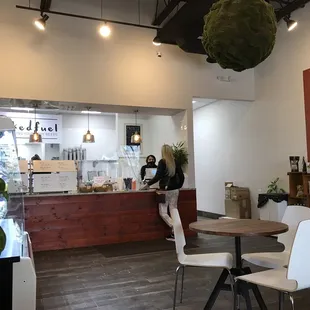 a man and a woman in a coffee shop