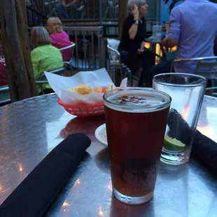 Beer and chips on the river walk at San Antonio
