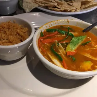 Bowl of Tortilla soup and side of Spanish rice! Soup is amazing