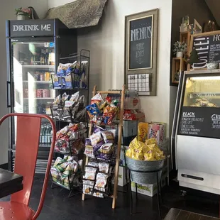 Chips and drinks, pastry case, coffee menu