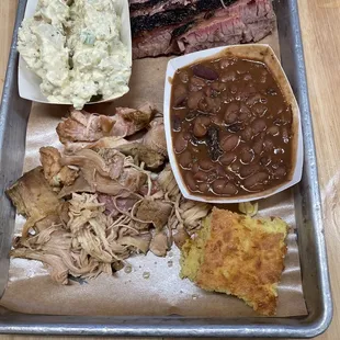 2 meat platter $16 Brisket and pulled chicken Beans, Potato Salad, Cornbread