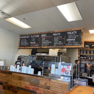 a man standing at a counter