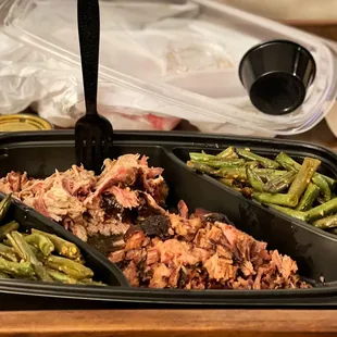 Double Garlic Green Beans, pulled pork to the top, chopped brisket to the bottom.