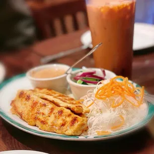 24. Chicken Satay; Thai Ice Tea 20oz