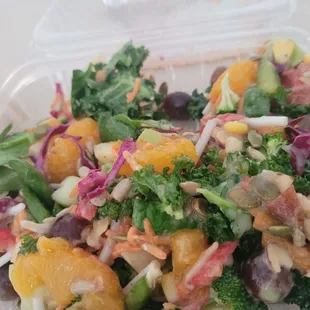 a salad in a plastic container