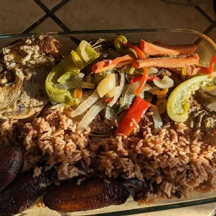 Roasted snapper, escovich, red beans and rice, and plantains.