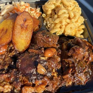 Oxtails,rice and peas,Mac and cheese,coleslaw and plantains