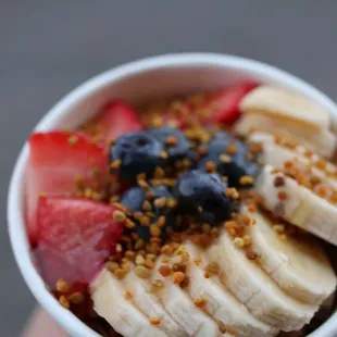 a bowl of fruit and granola