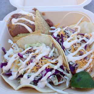 Baja fish tacos with beans and rice