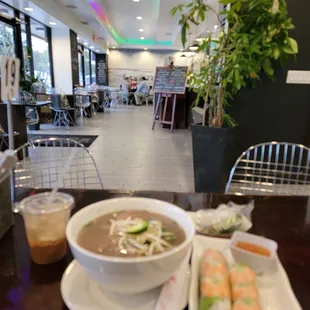 Pho Thai, shrimp spring rolls, iced coffee