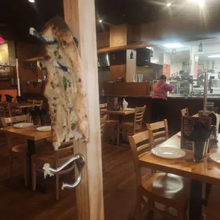 The "coat rack" display for the naan bread.