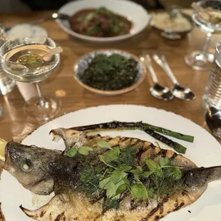 Branzino and Duck Confit in the distance