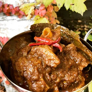 Slow-cooked bone-in Goat Curry
