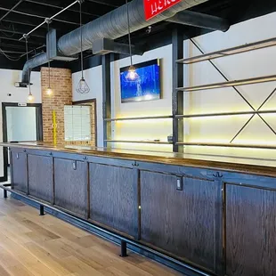 a bar with a television in the background