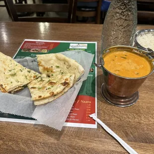 Chicken tikka masala with garlic butter naan