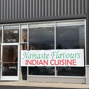 a woman entering a restaurant