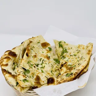 a basket of naan bread