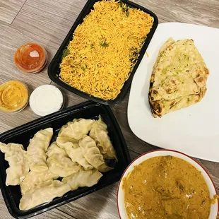 Chicken Biryani, Chicken Momo, Lamb Korma, Garlic Naan