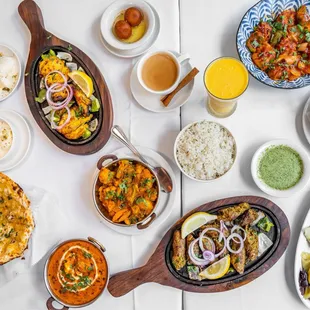 Garlic chess naan malai tikka chiken tikka masala veg momo fry chilly momo mango lassi gulab jamun lamb rogan josh vegetable curry