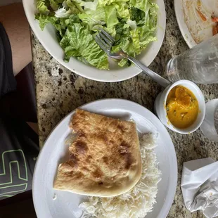 Salad, curry, rice and naan