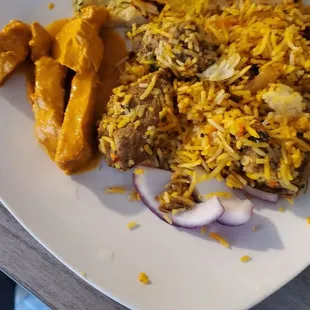 Butter chicken  and lamb rice with bead