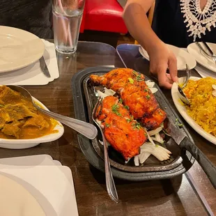 Goat curry, tandoori chicken, biryani