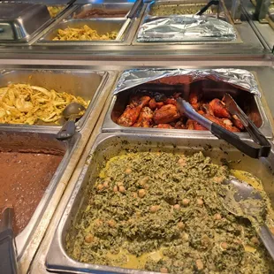a variety of food items in a buffet