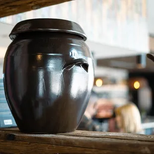 a large vase on a shelf