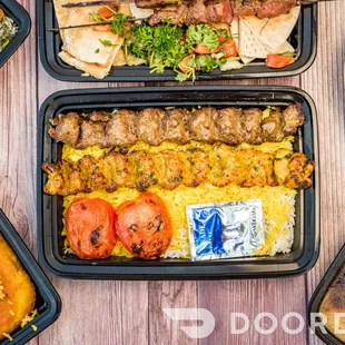 a variety of food in plastic containers