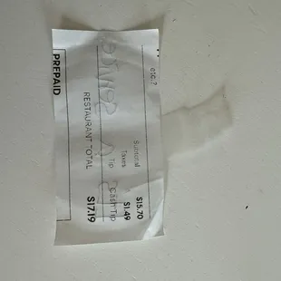 The passive aggressive note they made cut out from another customer&apos;s receipt