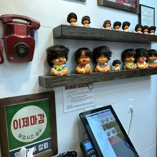 Cute vintage phones and dolls that add a homey touch