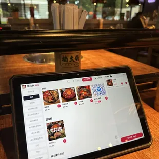 You order on tablet and the server bring out food.