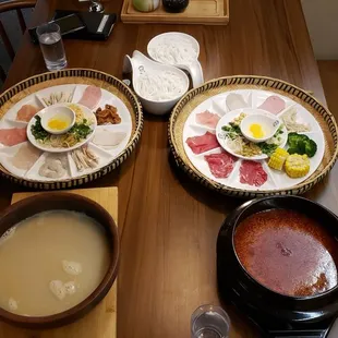 Crossing the bridge noodle soup (left), spicy version (right)