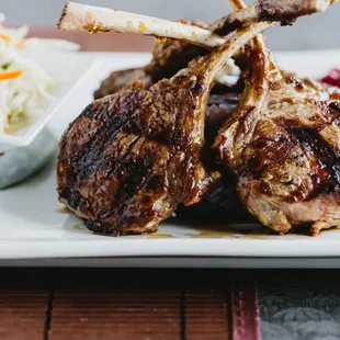 Thai-Style BBQ lamb chops with green papaya salad and sticky rice