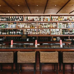 Full bar with Thai-inspired cocktails and over 150 wines