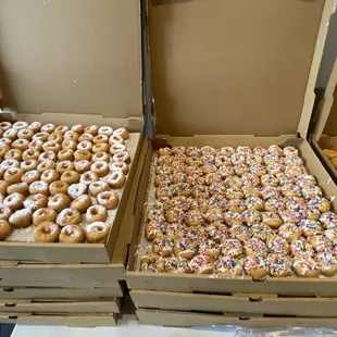 three boxes of mini doughnuts