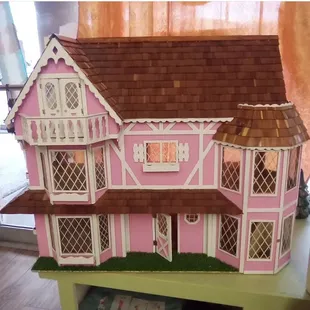 60 year old dollhouse with all sorts of beautiful furnishings to choose from... every little girls dream.