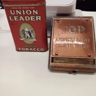 Vintage tins and cigarette roller.... Pretty neat!