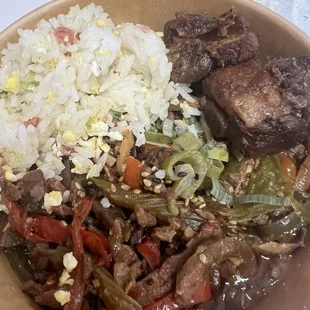 Right side Sweet and Sour Ribs/Left side Celery Pepper Beef and Fried rice