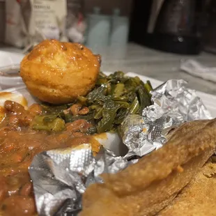 Tilapia, collard greens, pinto beans and cornbread.