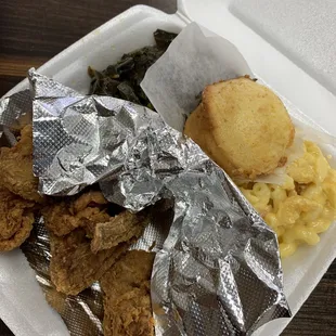 Chicken wings, Mac &amp; cheese, greens, and corn bread.