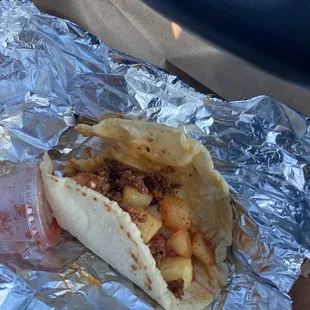 Chorizo with potato on a corn tortilla