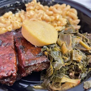 Ribs, Mac and cheese, collared greens and cornbread.  Yum!!!!!