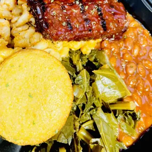 Ribs, greens, baked beans and Mac &amp; cheese