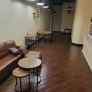 a coffee shop with leather furniture