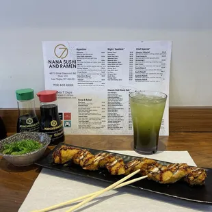 Sushi roll, seafood salad and Iced Match Green Tea
