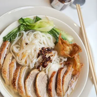 Duck Noodle soup topped with house chili oil
